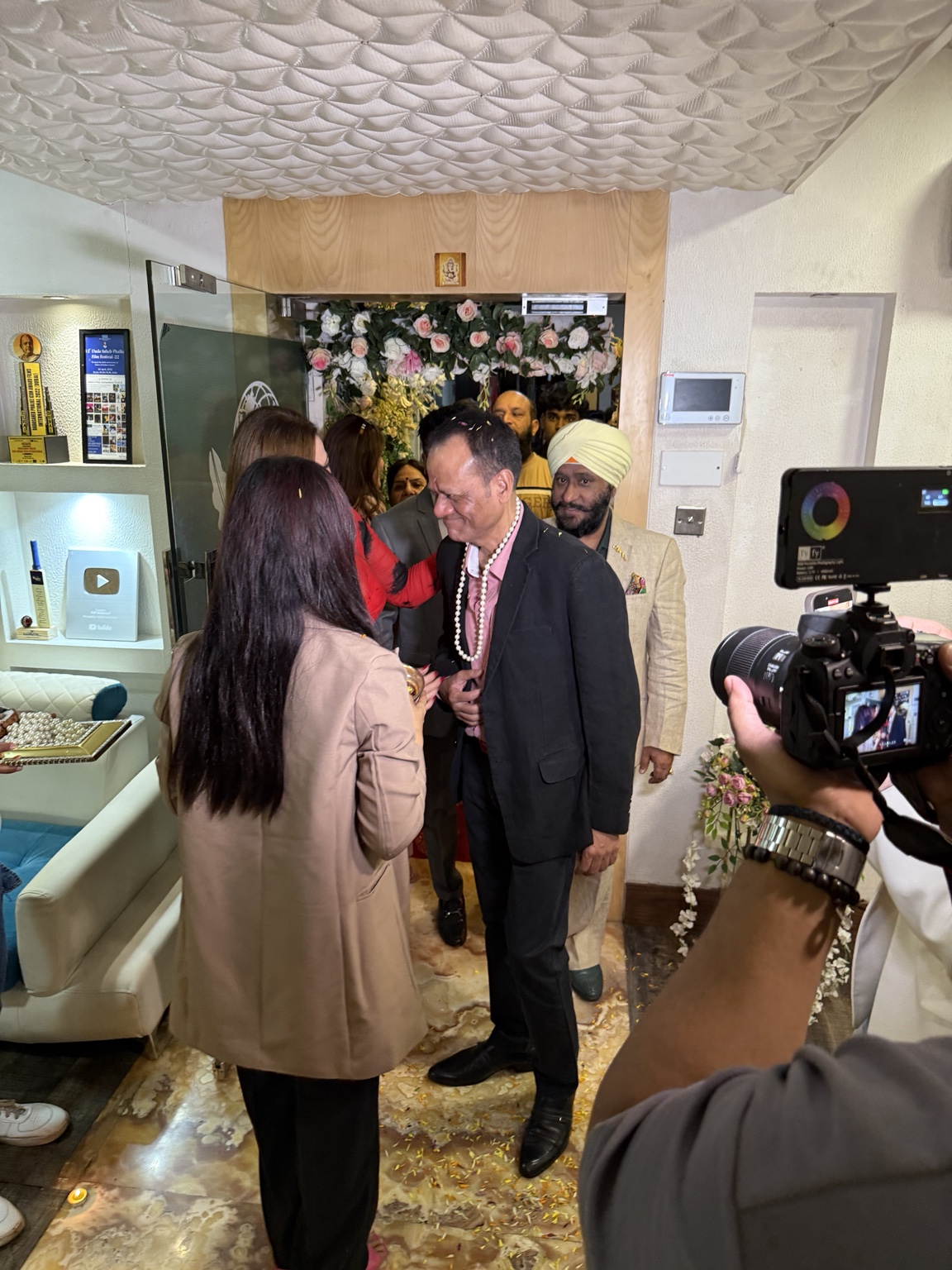 Guests being welcomed inside the India Branch
