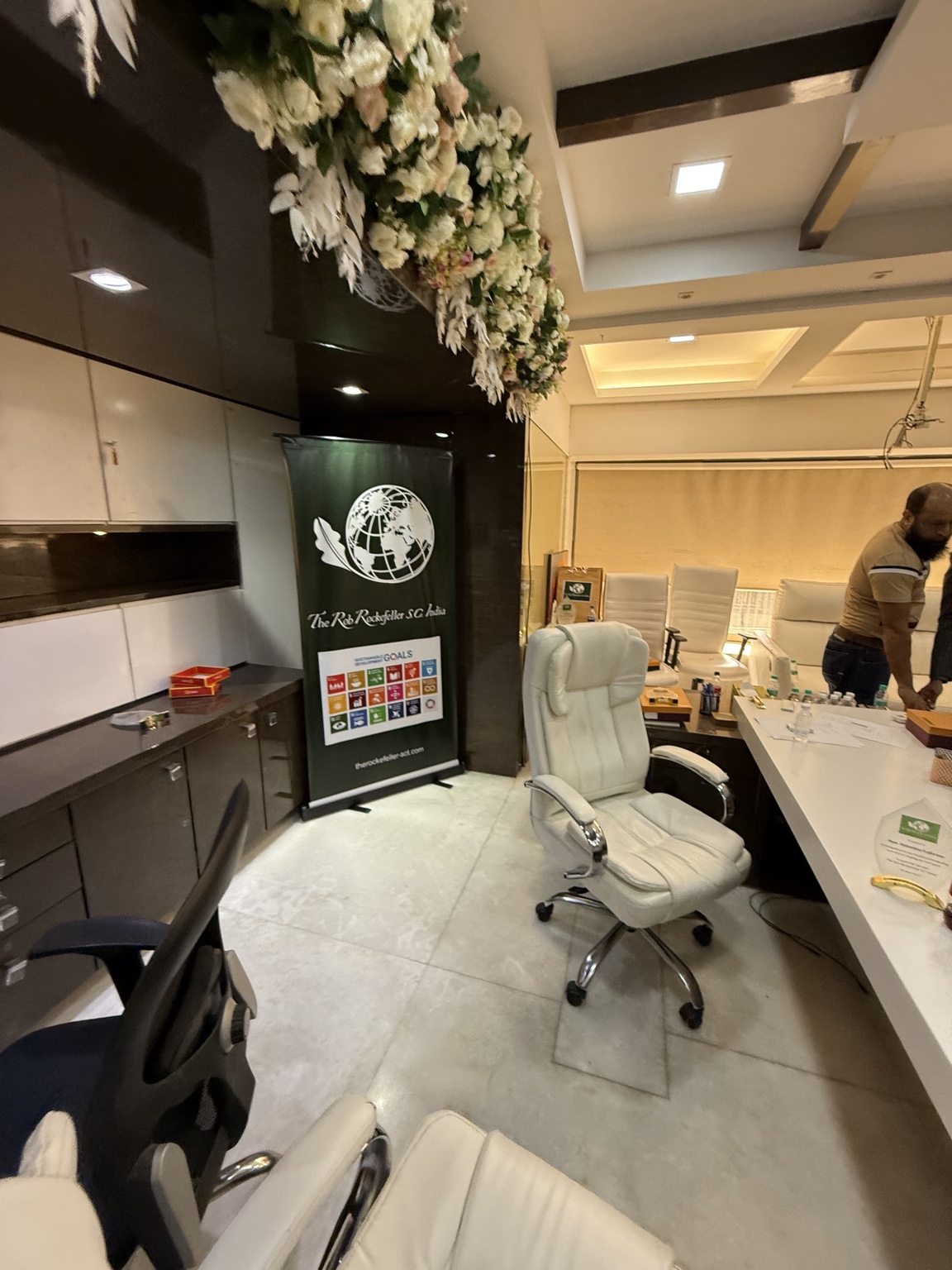 India office interior with a desk, seating and RRSC banner