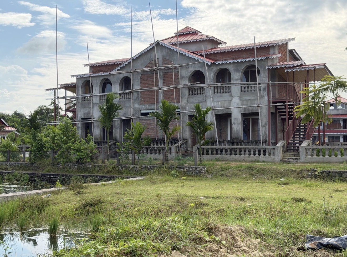 Large building under development at the RRSC Sustainability Development Centre in Ratuwamai, Koshi Province, Nepal