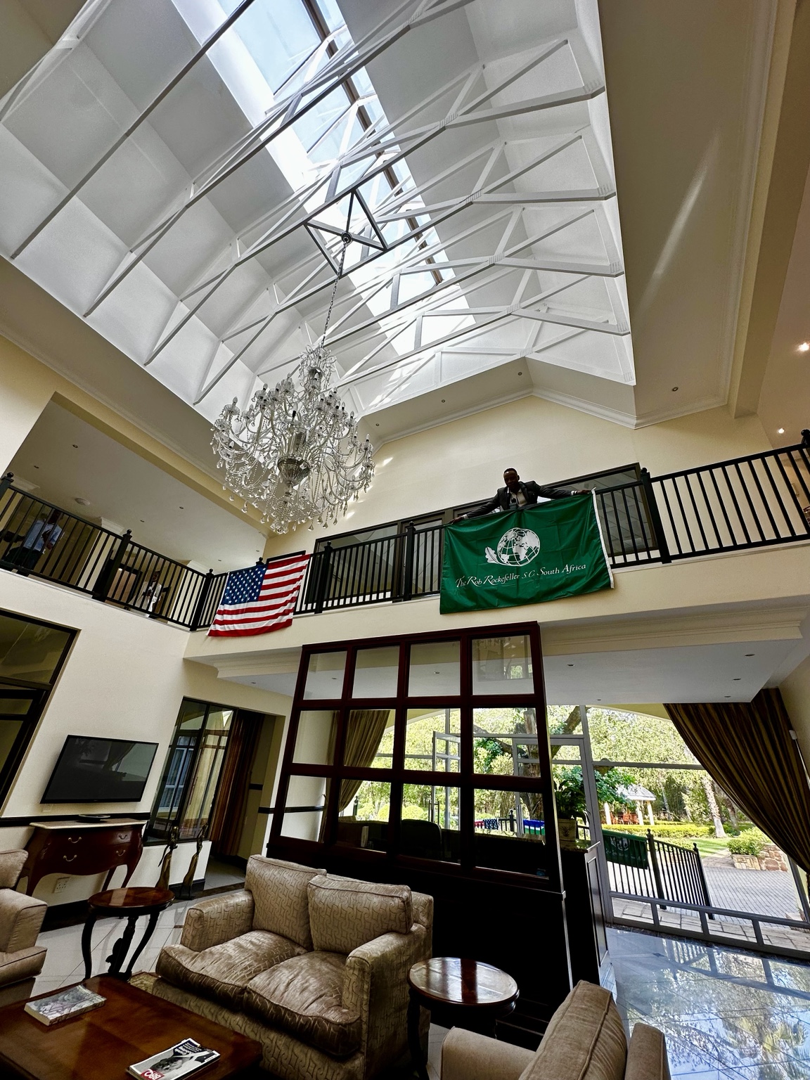 Atrium with the United States flag and RRSC South Africa banner