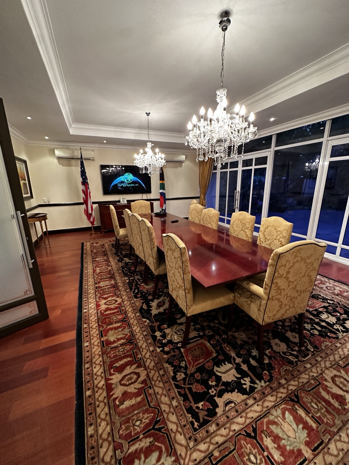 The Africa Center meeting room with flags and a long table