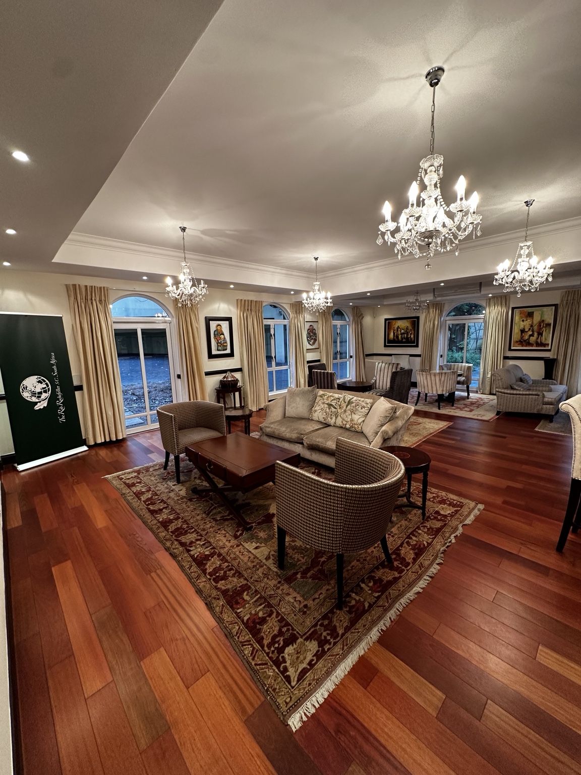 Reception lounge with seating and an RRSC South Africa banner