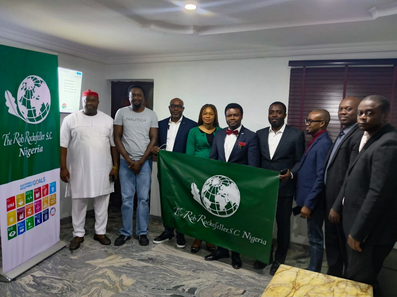 Nigeria team with the RRSC flag — original supplied photograph