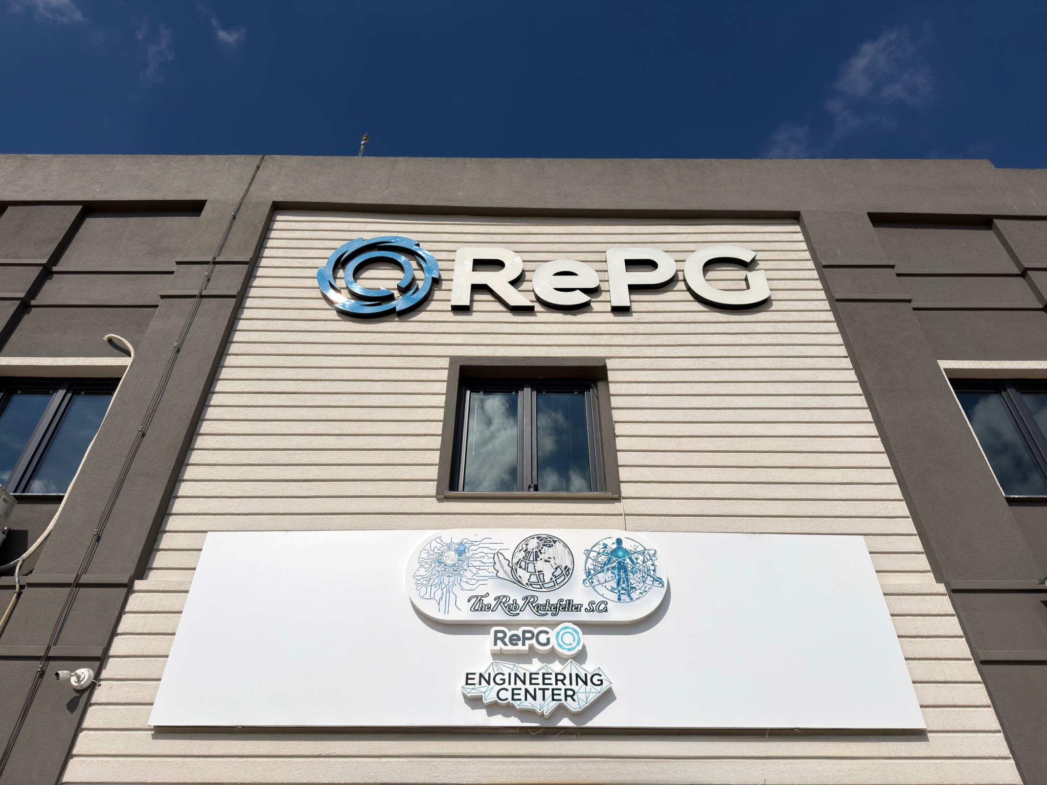 RePG and R. Rockefeller S.C. engineering center signage on the building facade.