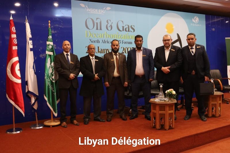 The Libyan delegation photographed together on the forum stage