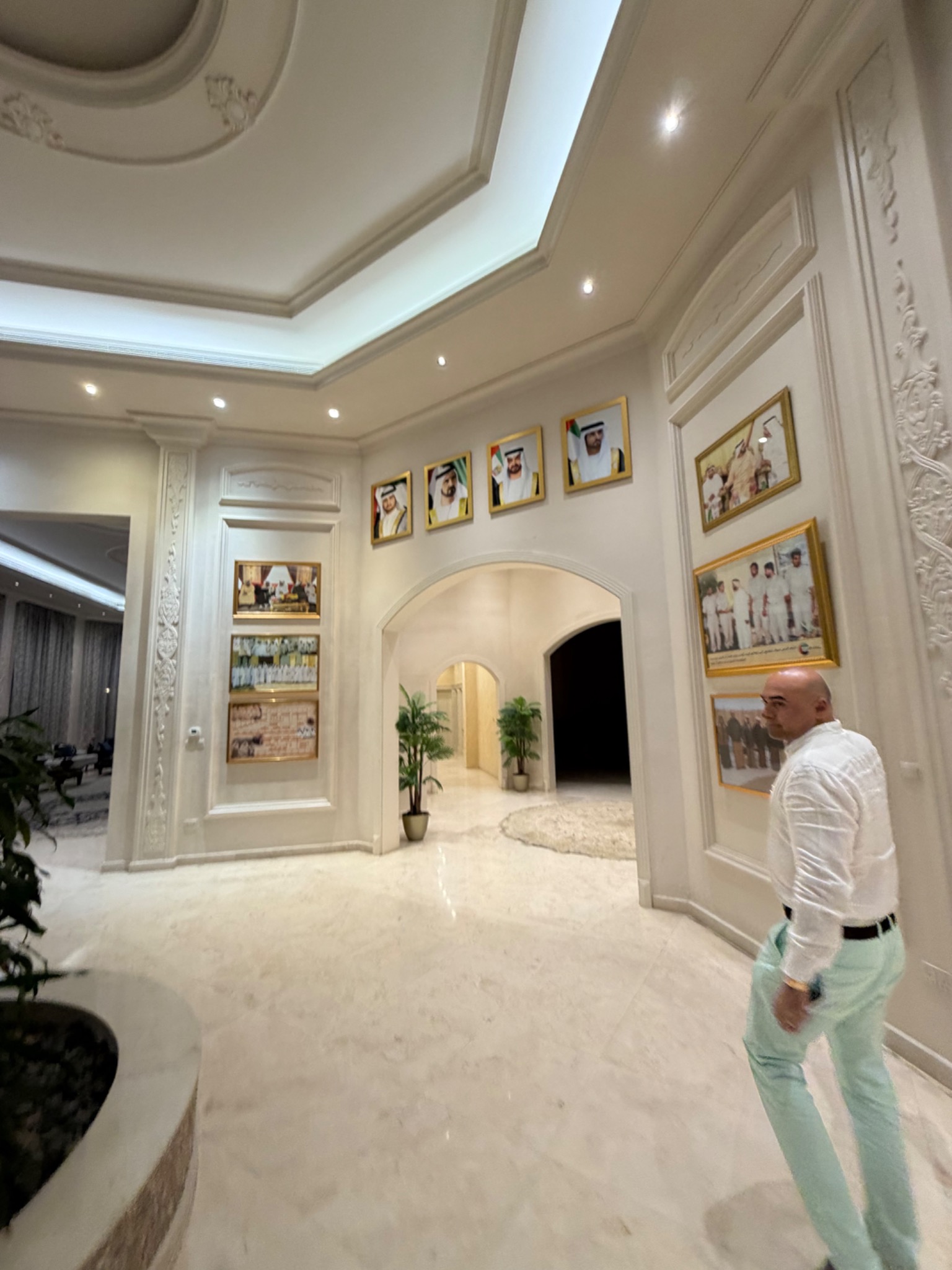 The entrance hall of Sheikh Awad’s private residence, with its collection of framed photographs.