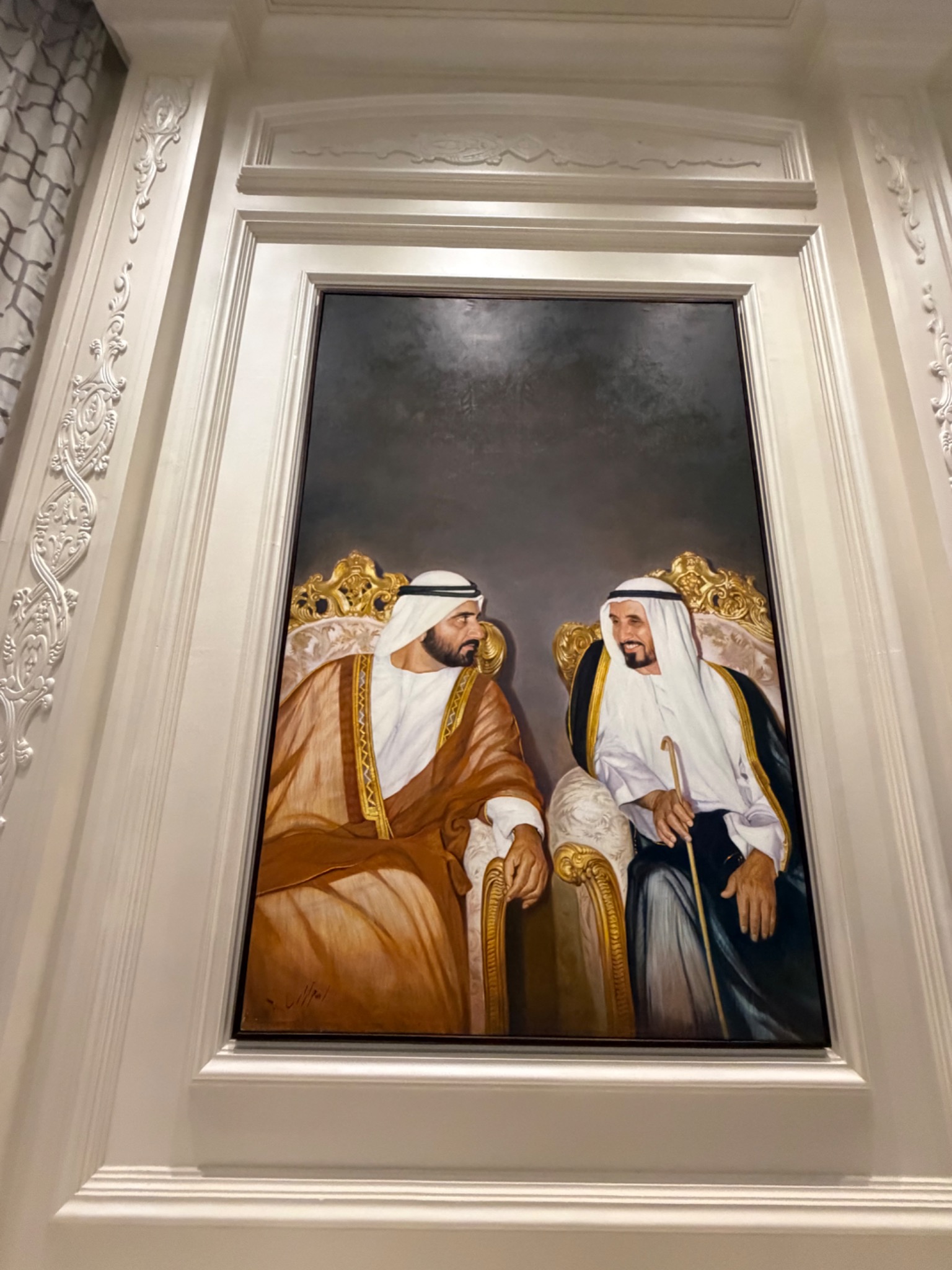 A framed portrait displayed in the majlis at Sheikh Awad’s private residence.